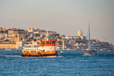 the Public Transport Ferry from Cais de Sodre to Cacilhas at the Rio Tejo near the City of Lisbon in Portugal.  Portugal, Lisbon, October, 2021のeditorial素材