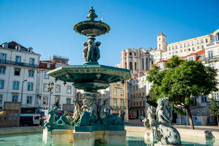 the Fountain with Mermaid Statues of the Rossia Square in Baixa in the City of Lisbon in Portugal.  Portugal, Lisbon, October, 2021のeditorial素材