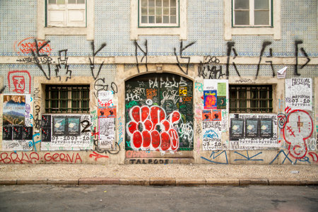 Graffiti on a Building in Baixa in the City of Lisbon in Portugal.  Portugal, Lisbon, October, 2021