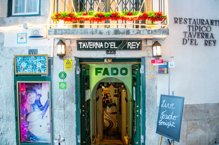 a traditional Fado Music Restaurant in a street and alley in Alfama in the City of Lisbon in Portugal.  Portugal, Lisbon, October, 2021のeditorial素材