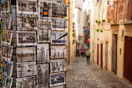 a Postcard shop in a street and alley in Alfama in the City of Lisbon in Portugal.  Portugal,...