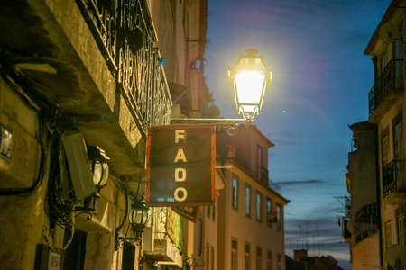 a traditional Fado Music Restaurant in a street and alley in Alfama in the City of Lisbon in Portugal.  Portugal, Lisbon, October, 2021のeditorial素材