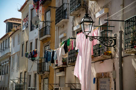 a street and alley in Alfama in the City of Lisbon in Portugal.  Portugal, Lisbon, October, 2021のeditorial素材