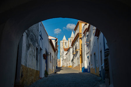 a small alley in  the Town and Castle of Avis with the Church Misericordia in Alentejo in Portugal. ...
