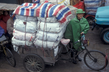 Traffic Jam with goods Carrier at the Marketstreet near the Market and the Bus Terminal in the City...