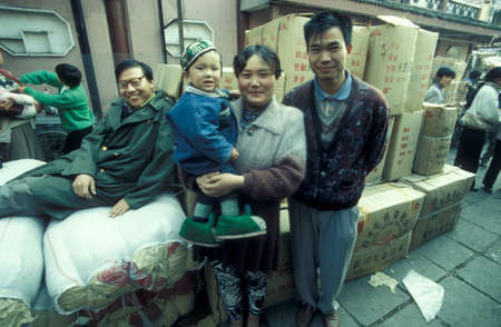 a goods market in the City of Kaifeng in the Province of Henan in China. China, Kaifeng, November, 1996のeditorial素材