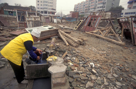 a construction site in the City of Kaifeng in the Province of Henan in China. China, Kaifeng, November, 1996のeditorial素材