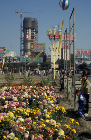 the city square and park at an Alcohol and Tabac Fair in the City of Nanchang in the Province of Jiangxi in China. China, Nanchang, November, 1996のeditorial素材