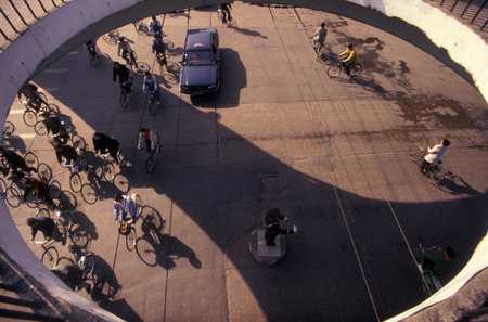 a traffic cycle in the City of Nanchang in the Province of Jiangxi in China. China, Nanchang, November, 1996のeditorial素材