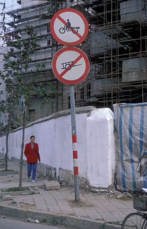 Traffic signs in the City of Nanchang in the Province of Jiangxi in China. China, Nanchang, November, 1996のeditorial素材