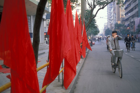 Red Chinese Flag in the City of Nanchang in the Province of Jiangxi in China. China, Nanchang, November, 1996のeditorial素材