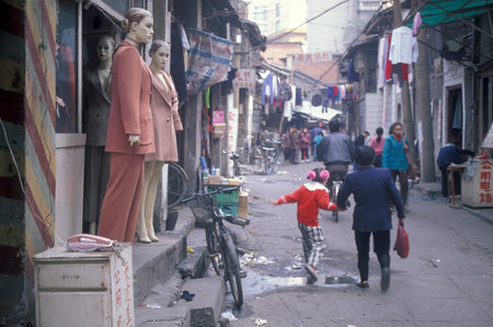 a street market in the City of Nanchang in the Province of Jiangxi in China. China, Nanchang, November, 1996のeditorial素材