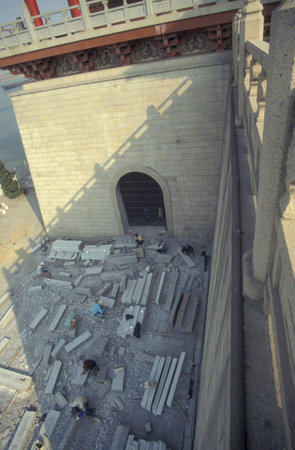 stone metz worker and construction at the Temple and Pavilion of Prince Teng at the Ganjiang River in the City of Nanchang in the Province of Jiangxi in China. China, Nanchang, November, 1996のeditorial素材