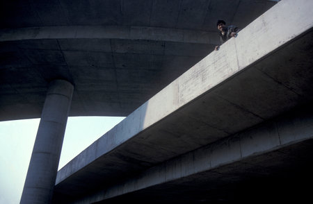a highway bridge construction on the ganjiang river in the city of nanchang in the province of jiangxi in china. China, Nanchang, November, 1996のeditorial素材