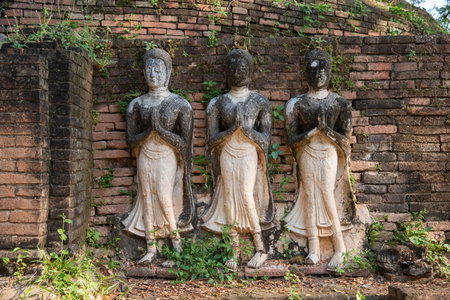 Ruins of Wat Wihan Thong Historical Site next to Chandra Palace in city and province of Phitsanulok...