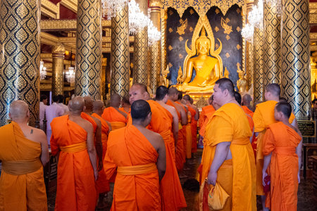 Monks at Wat Phra Si Rattana Mahathat in the city of Phitsanulok in Thailand. Thailand, Phitsanulok, December, 1, 2024.のeditorial素材
