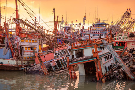 Old Wood Fishing Boats at the Harbor in Rayong City in the Province of Rayong in Thailand, Thailand, Rayong, October, 24, 2024のeditorial素材
