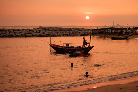 a sunset at Laem Charoen Beach in Rayong City in Province of Rayong in Thailand, Thailand, Rayong, October, 25, 2024のeditorial素材