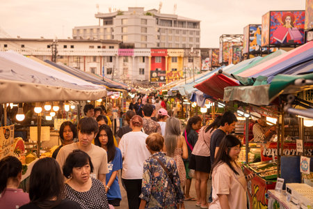 People at Star Night Bazaar with the Art paintings at Night Market in City and Province of Rayong in...