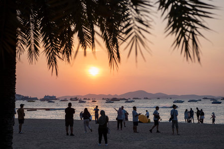 a view by sunset of the Landscape at the Pattaya Beach on the Pattaya Bay in the city of Pattaya in...