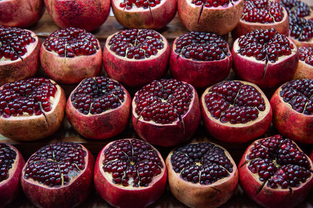 Pomegranate Fruits at a Market in the city of Pattaya and Province of Chonburi in Thailand,...