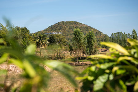 the landscape of the Phu Kum Khao Mountain and Dinosaur Fossil Excavation site near the Sirindhorn Museum at the Town of Sahatsakhan near the City of Kalasin in the Province of Kalasin in Thailand. Thailand, Kalasin, December, 2024のeditorial素材