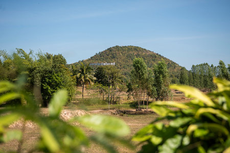 the landscape of the Phu Kum Khao Mountain and Dinosaur Fossil Excavation site near the Sirindhorn Museum at the Town of Sahatsakhan near the City of Kalasin in the Province of Kalasin in Thailand. Thailand, Kalasin, December, 2024のeditorial素材