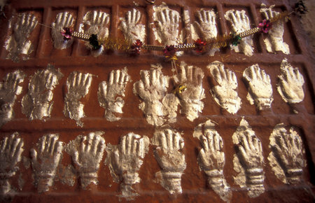 Women Queens Handprints of Sati and grid of Sculpted hands at the Meherangarh in the Town of Jodhpur...
