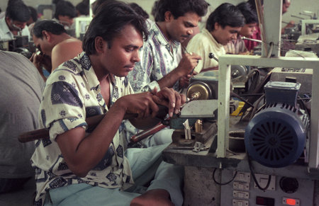 Working people in a factory of gemstone cutting in the city of Jaipur in the province of Rajasthan in India. India, JAIPUR, January, 1998のeditorial素材