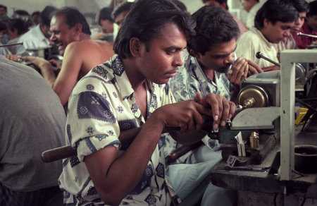 Working people in a factory of gemstone cutting in the city of Jaipur in the province of Rajasthan in India. India, JAIPUR, January, 1998のeditorial素材