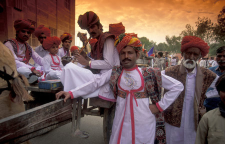A camel herder in traditional Rajasthani dress at the Bikaner Camel Festival in the Town of Bikaner...