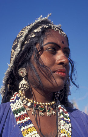 a portrait of a Rajasthani woman in the Town of Jaisalmer in the Province of Rajasthan in India....