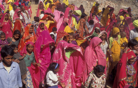 Traditionally dressed Rajasthani women at a traditional funeral in the town of Pushkar in the...