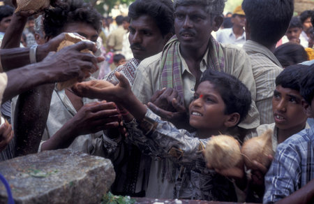 a coconut ceremony at Holi Hindu Temple Festival at the Virupaksha Temple in the town of Hampi in the Province of Karnataka in India. India, Karnataka, March, 1998のeditorial素材