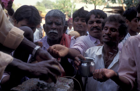 a coconut ceremony at Holi Hindu Temple Festival at the Virupaksha Temple in the town of Hampi in the Province of Karnataka in India. India, Karnataka, March, 1998のeditorial素材