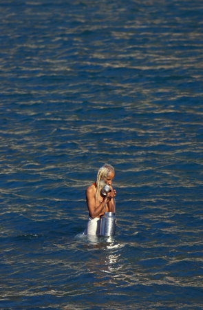 a Holy men and Street Sadhus at the Holy Ganges River in the city of Rishikesh in the Province of Uttarakhand in India. India, Rishikesh, February, 1998のeditorial素材