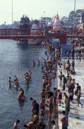 Hindi Pilgrim taking a bath in the Ganges River in the city of Haridwar in the Province of Uttarakhand in India. India, Haridwar, April, 1998のeditorial素材