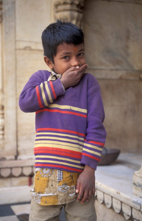 a portrait of a boy in the town of Jaisalmer in the province of Rajasthan in India. India, Jaisalmer, January, 1998のeditorial素材