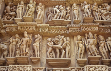 Erotic Sculptures at the erotic Temple or Hindu Temple of Kandarija Mahadeva Temple in the city of Khajurao in Province Madhya Pradesh in India. India, Khajurao, April, 1998のeditorial素材