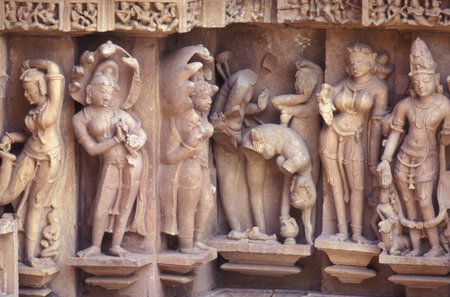 Erotic Sculptures at the erotic Temple or Hindu Temple of Kandarija Mahadeva Temple in the city of Khajurao in Province Madhya Pradesh in India. India, Khajurao, April, 1998のeditorial素材