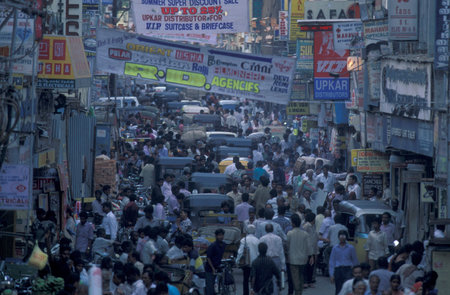 Traffic and pollution with cars, bus amd motorcycle on a mainroad in the city of Chennai in Tamil...