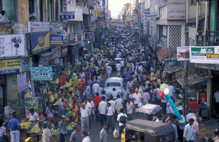 Traffic and pollution with cars, bus amd motorcycle on a mainroad in the city of Chennai in Tamil...