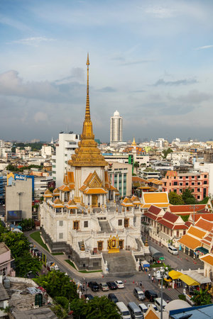 a view of Wat Traimit Withayaram Worawihan in China Town in the city of Bangkok in Thailand....