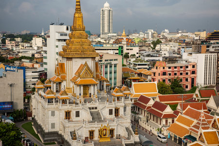 a view of Wat Traimit Withayaram Worawihan in China Town in the city of Bangkok in Thailand....