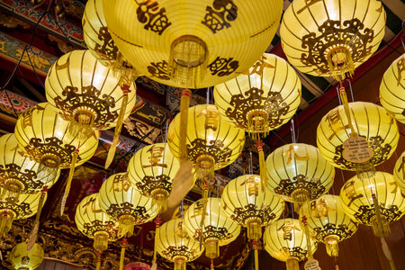 Chinese Lanterns at Wat Mangkon Kamalawat or Wat Leng Noei Yi in China Town in the city of Bangkok in Thailand. Thailand, Bangkok, November, 8, 2023