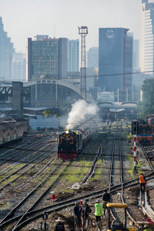 an old steam locomotive on the route from Old Hua Lamphong Railway Station in China Town to...
