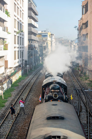 an old steam locomotive on the route from Old Hua Lamphong Railway Station in China Town to...