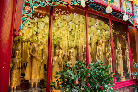 Buddha figures at Wat Mangkon Kamalawat or Wat Leng Noei Yi in China Town in the city of Bangkok in Thailand. Thailand, Bangkok, November, 8, 2023のeditorial素材