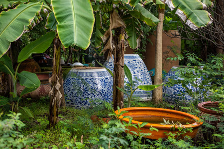 Pots in a garden at the Tao Hong Tai Ceramics Shop and Factory in the city and Province of Ratchaburi in Thailand, Thailand, Ratchaburi, November, 14, 2023のeditorial素材