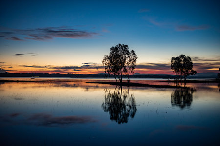 sunrise at Lake Sirindhorn Dam near the Town of Khong Chiam in Province of Ubon Ratchathani in...